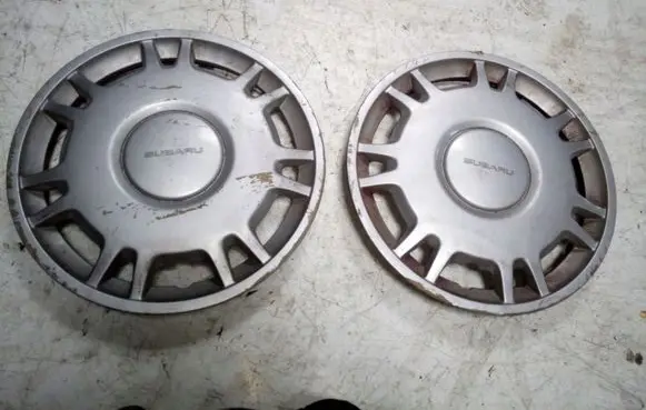 Subaru Impreza I R14 wheel hub/cap/trim 28811AC130