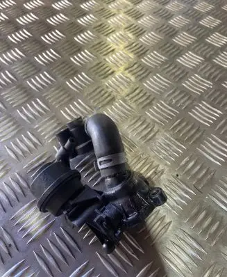 Thermostat/thermostat housing