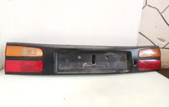Renault Laguna I Trunk door license plate light bar 7700420119