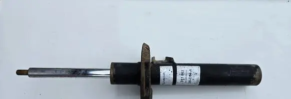 Volkswagen Caddy Front shock absorber with coil spring 311863 36D94A 824904003414