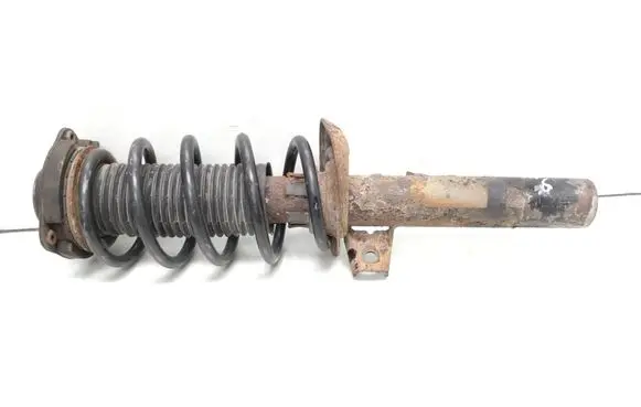 Volkswagen PASSAT B7 Front shock absorber with coil spring 1K0412331C