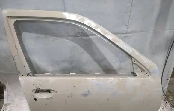 Nissan Primera Front door PILKOS