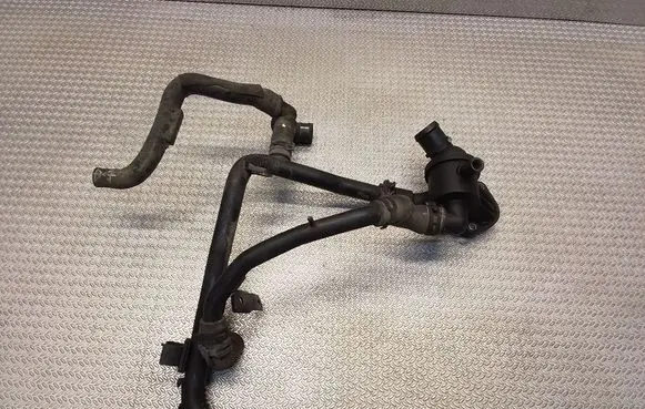 Volkswagen Caddy Engine coolant pipe/hose 03L121111 03L121065AJ