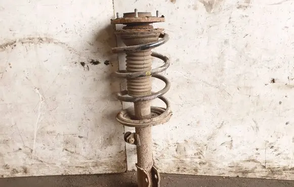 Toyota Corolla E120 E130 Front shock absorber with coil spring