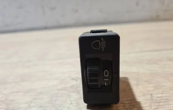 Headlight level height control switch