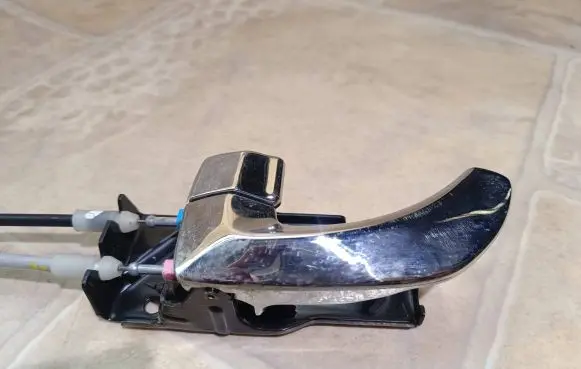 KIA Opirus Rear door interior handle trim 