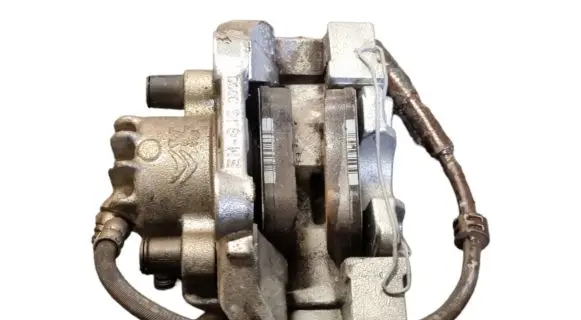 Peugeot 208 Front brake caliper 9835571780