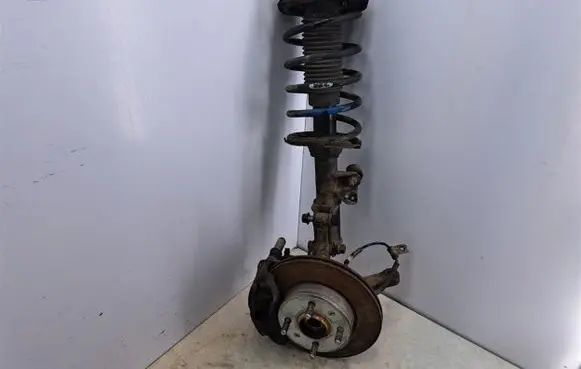 Front shock absorber with coil spring