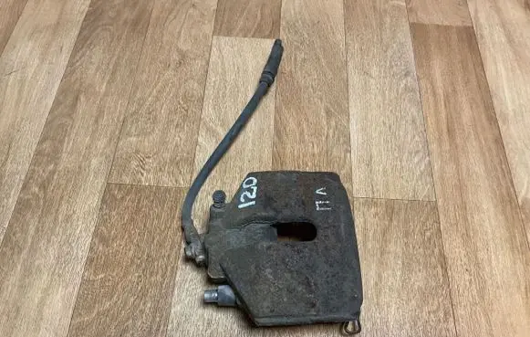 Volkswagen PASSAT B6 Front brake caliper 11810252012