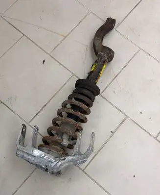 Cadillac SRX Front shock absorber with coil spring 