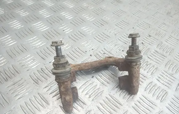 Volkswagen PASSAT B5.5 Brake caliper pad carrier rear 