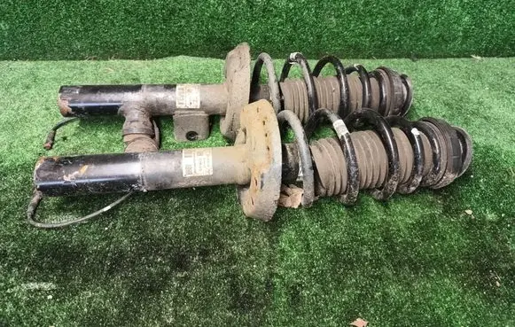 Opel Astra J Front shock absorber/damper 13376615