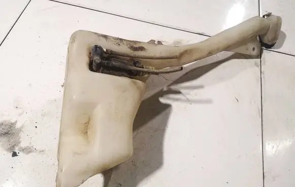 Renault Laguna I Windshield washer fluid reservoir/tank 7701672449