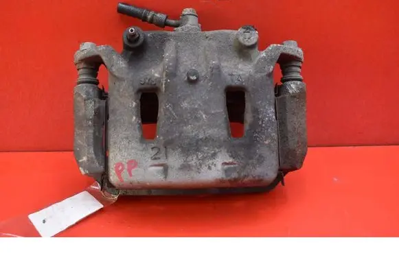 Nissan Leaf I (ZE0) Front brake caliper 