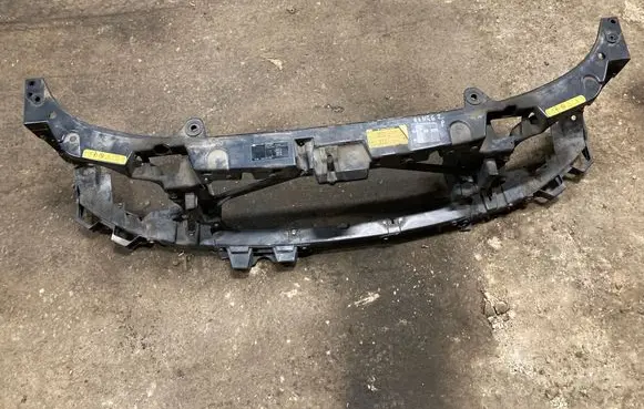 Radiator support slam panel