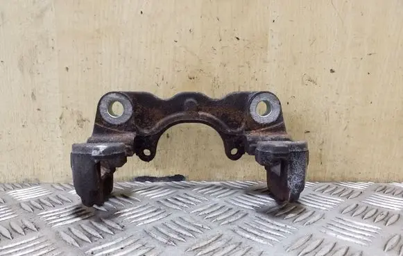 Volkswagen Touareg I Brake caliper pad carrier rear 