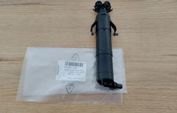 Volkswagen Polo VI Headlight washer nozzle holder 6C0955104A