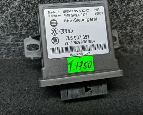 Volkswagen Touareg I Light module LCM 7L6907357