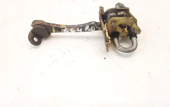 Front door check strap stopper