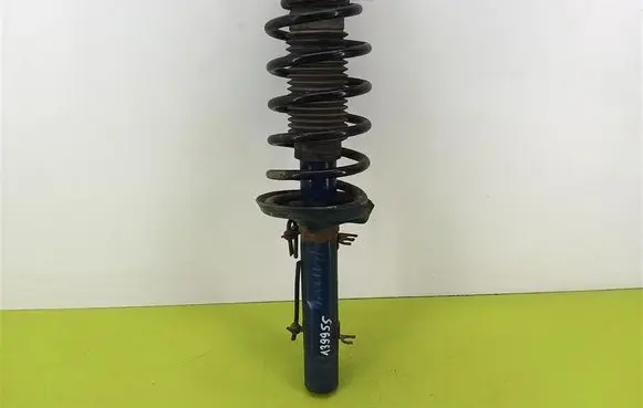 Front shock absorber with coil spring