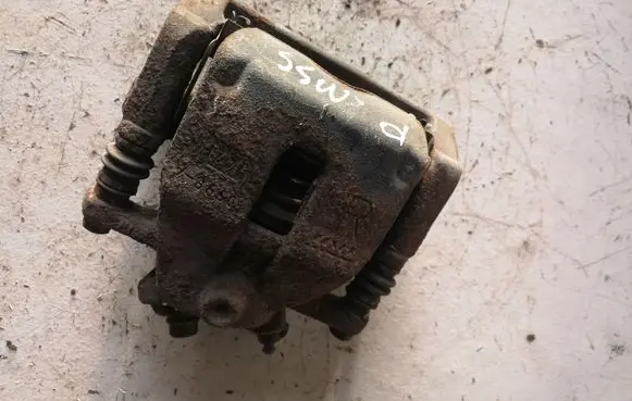Suzuki Swift I Front brake caliper