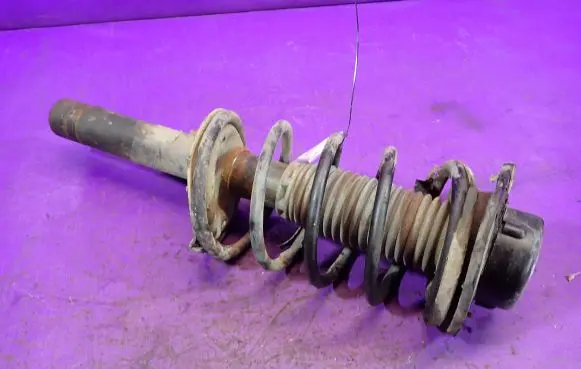Front shock absorber with coil spring