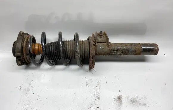 Front shock absorber with coil spring