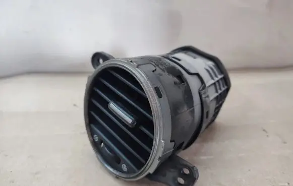KIA Carens II Dash center air vent grill 974401D000