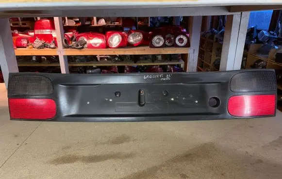 Renault Laguna I Trunk door license plate light bar 22260002 7700820049