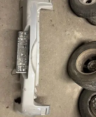 Suzuki Grand Vitara II Rear bumper 7181165J10