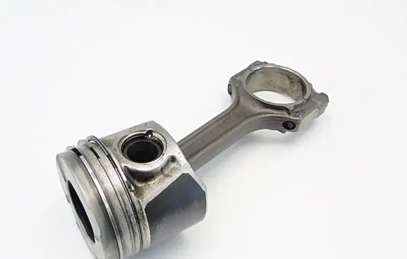 Opel Corsa D Piston with connecting rod 73502643
