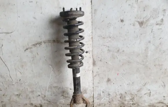Front shock absorber with coil spring