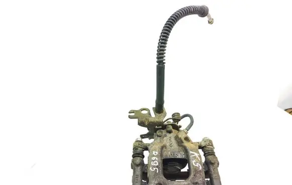 Volkswagen Caddy Rear brake caliper 