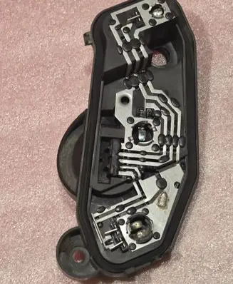 Tail light bulb cover holder