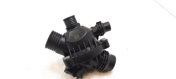 Thermostat/thermostat housing