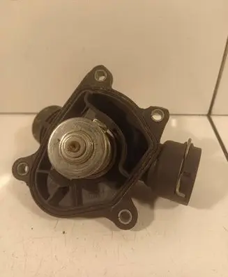 Thermostat/thermostat housing