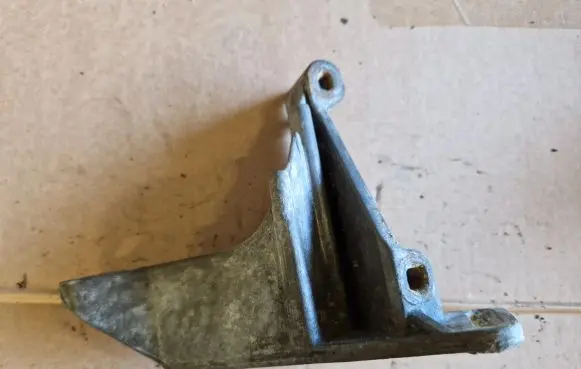 Volkswagen Golf II Power steering pump mounting bracket 027145531