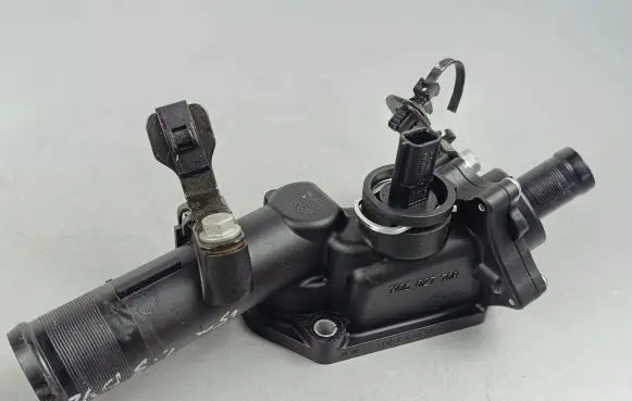 Thermostat/thermostat housing