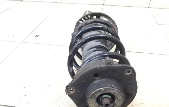 Skoda Yeti (5L) Front shock absorber with coil spring 1K0412022E