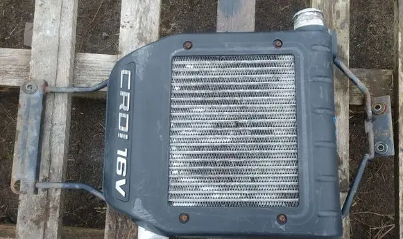 KIA Carens I Intercooler radiator 2827127360