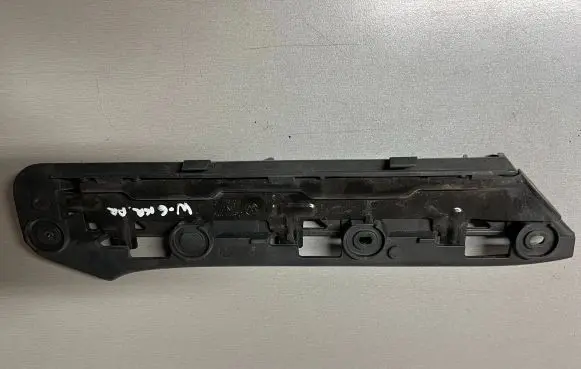 Volkswagen Touran I Front bumper mounting bracket 1T0807049