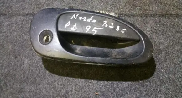 Mazda 323 Front door exterior handle