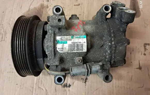 Nissan Juke I F15 Air conditioning (A/C) compressor (pump) 92600AZ74A