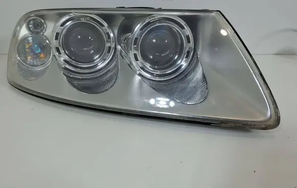Volkswagen Touareg I Headlight/headlamp 7L6941016BB 89307861