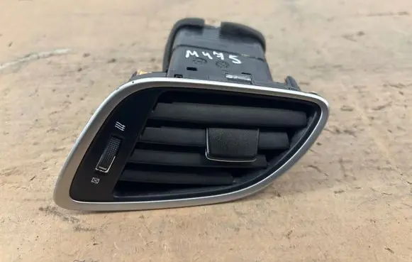 Suzuki Baleno IV Dash center air vent grill 7363068P00