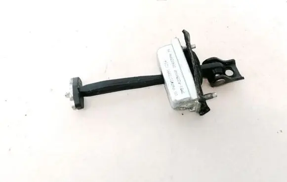 Rear door check strap stopper