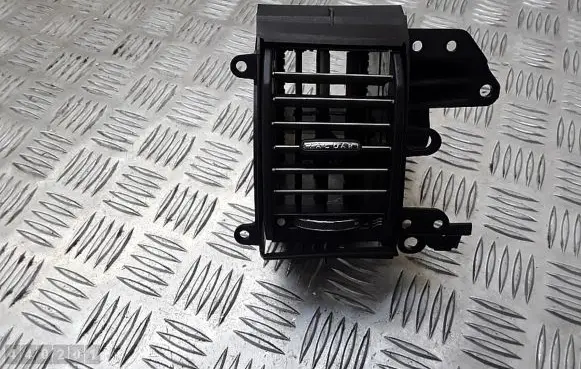 Jaguar XF Dash center air vent grill DRS6615Z03