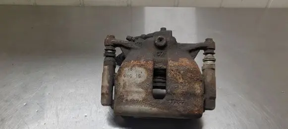 Volkswagen Golf VII Front brake caliper 6799C