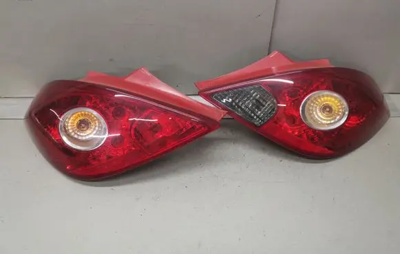 Opel Corsa D Rear/tail lights set 13186351 13186350