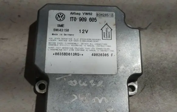 Volkswagen Touran I Airbag control unit/module 1T0909605